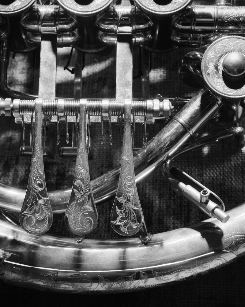 Engraved valve levers of the custom horn, seen close